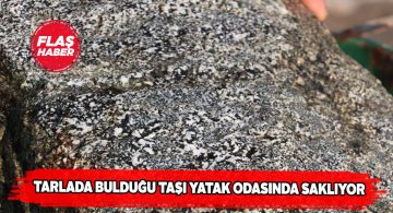 Göktaşına benzeyen ilginç taşı evinde saklıyor