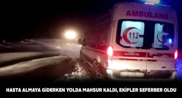 Kardan dolayı yolda mahsur kalan ambulansı ekipler kurtardı