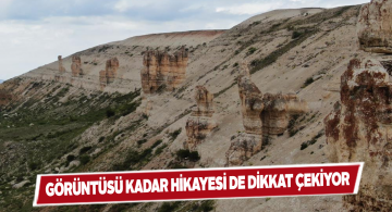 Kangal ilçesindeki dev kayalıklar ziyaretçilerin dikkatini çekiyor