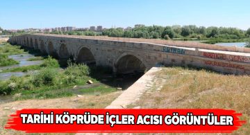 Tarihi Kesik köprüye sprey boya ile yazı yazdılar