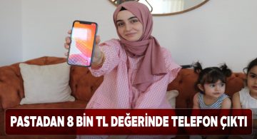 Doğum günü pastasının içerisinde cep telefonu sürprizi