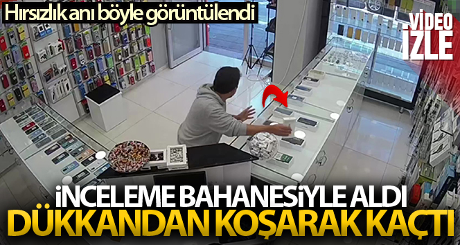 Telefoncularda incelediği telefonları bir anda alıp kaçtı