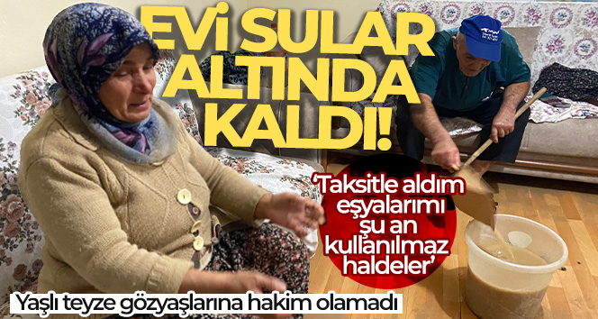 Evi sular altında kalan yaşlı teyze gözyaşlarına hakim olamadı