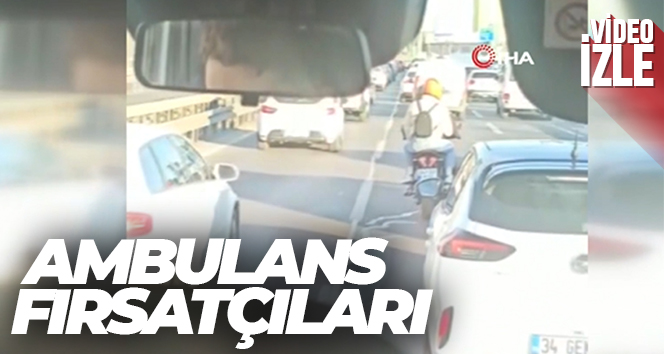 Ambulansın peşine takılan fırsatçı sürücüler kamerada