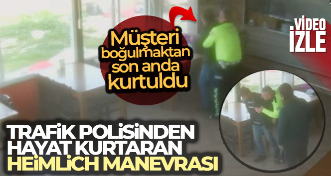Trafik polisinden hayat kurtaran Heimlich manevrası