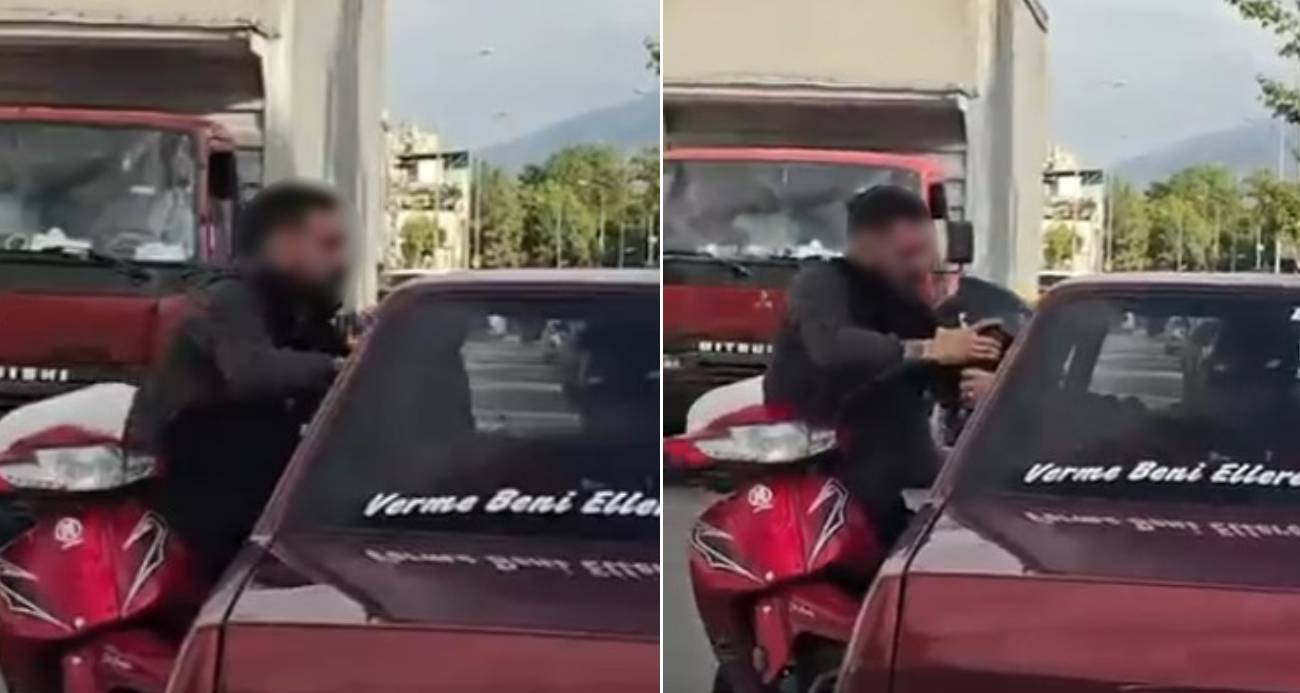 Bursa’da Trafikte Tehlikeli Anlar: Motosikletli Sürücü Otomobilin Camına Uzandı