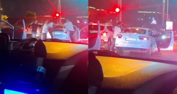 Trafikte yaşanan tekmeli, yumruklu kavgayı ayırmaya çalışan kadının zor anları kamerada