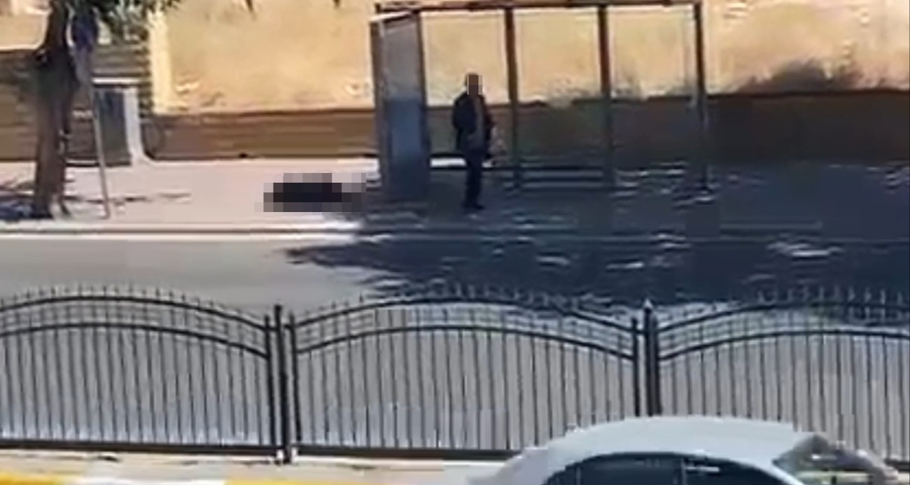 Durakta bekleyen eşini silahla vurdu