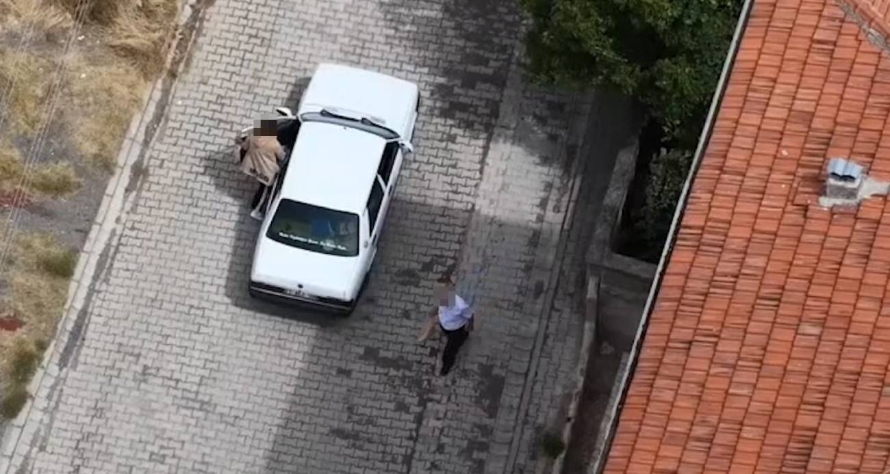 Ehliyeti yoktu, denetimden kaçtı: Yolcuyla yer değiştirirken görüntülendi
